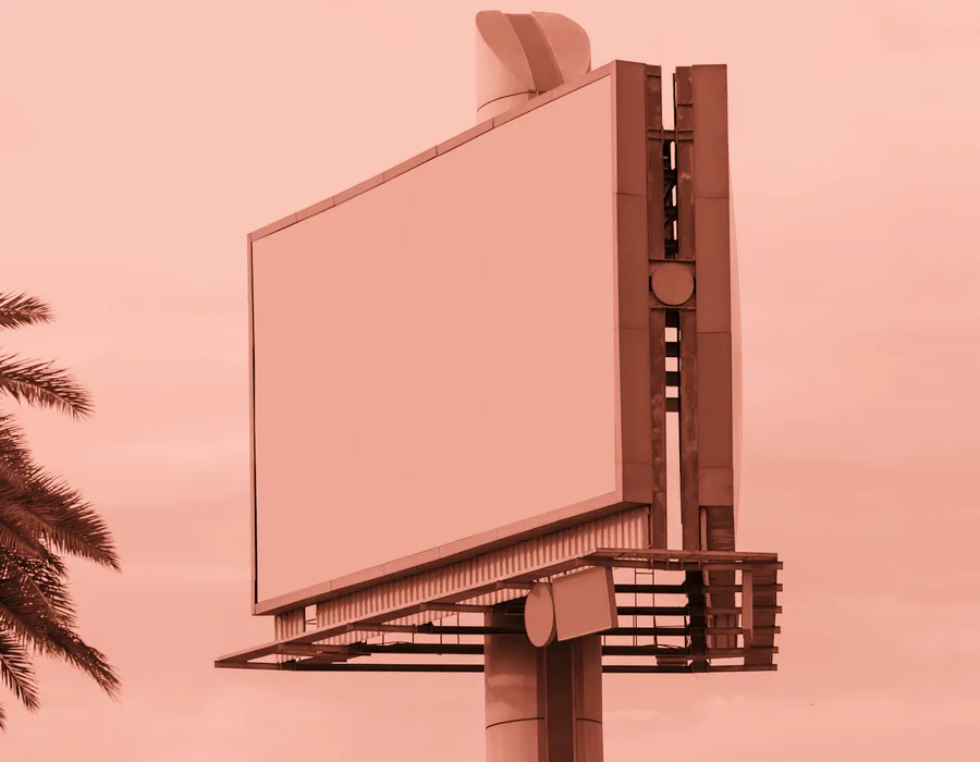 A blank roadside billboard, the surface the Kestrel Boots campaign was booked onto
