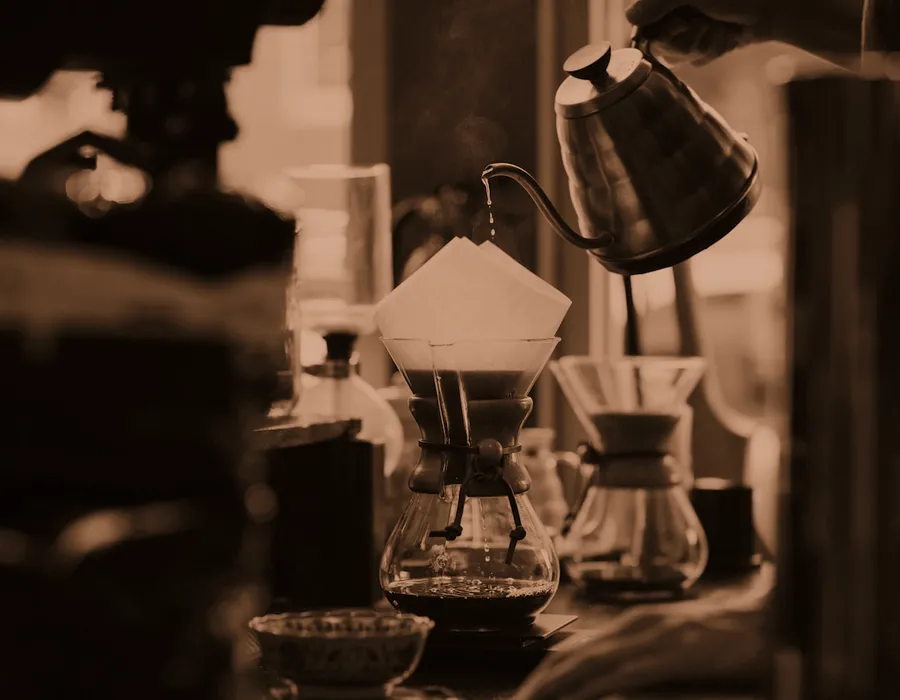 A brew bar with pour-over filters and a gooseneck kettle