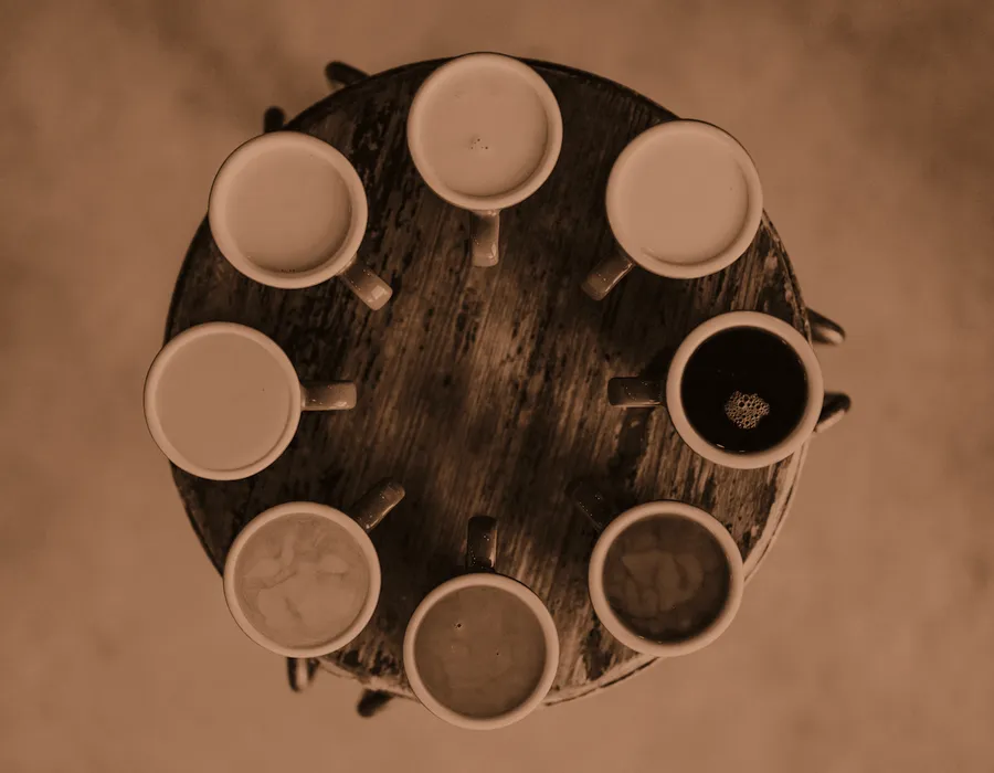 A cupping table set with cups arranged in a circle