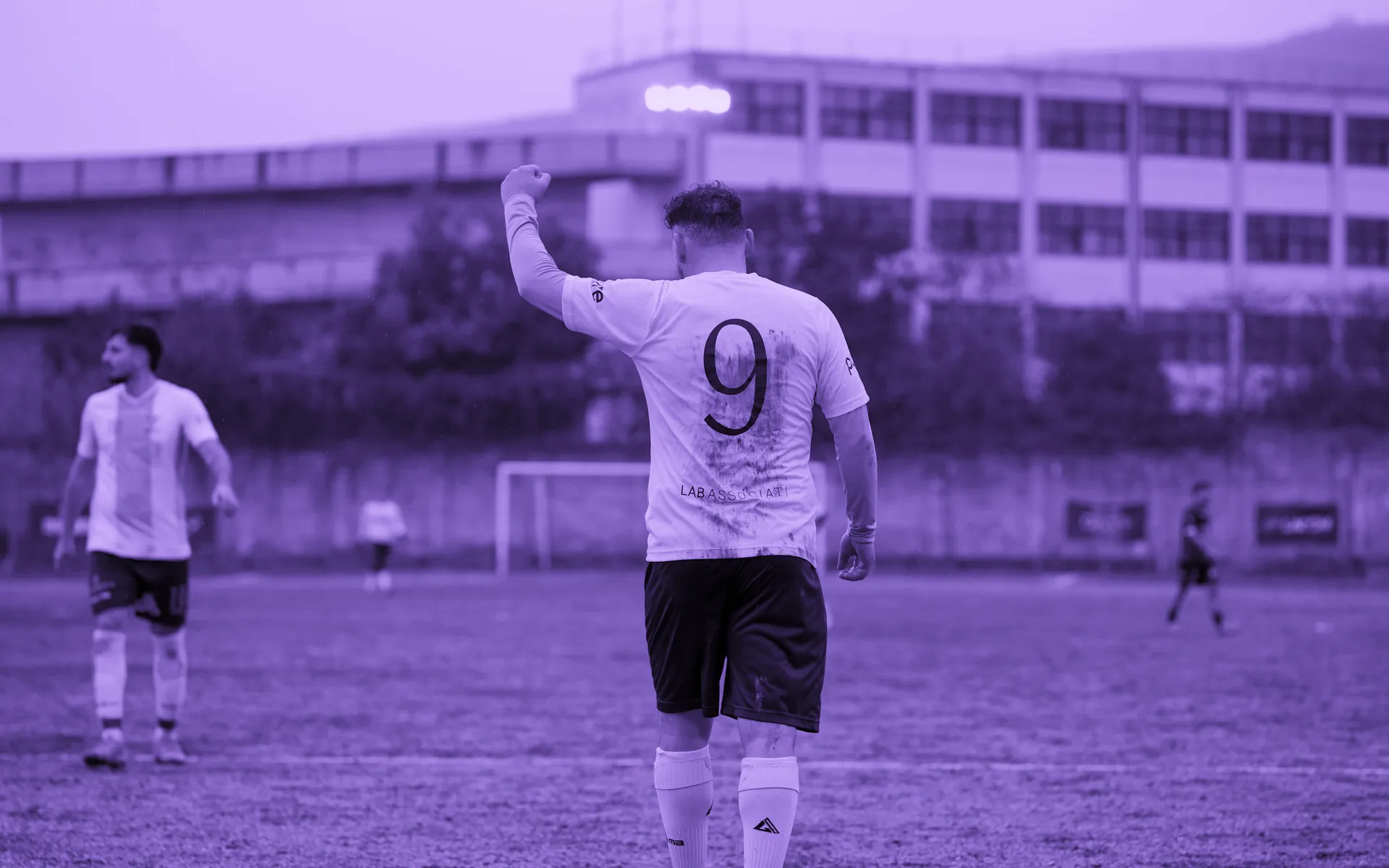 A Marsh End player turning to the away end after scoring at Brickfield Lane